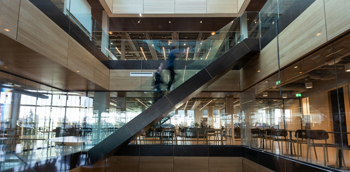 Modern office interior with glass staircase